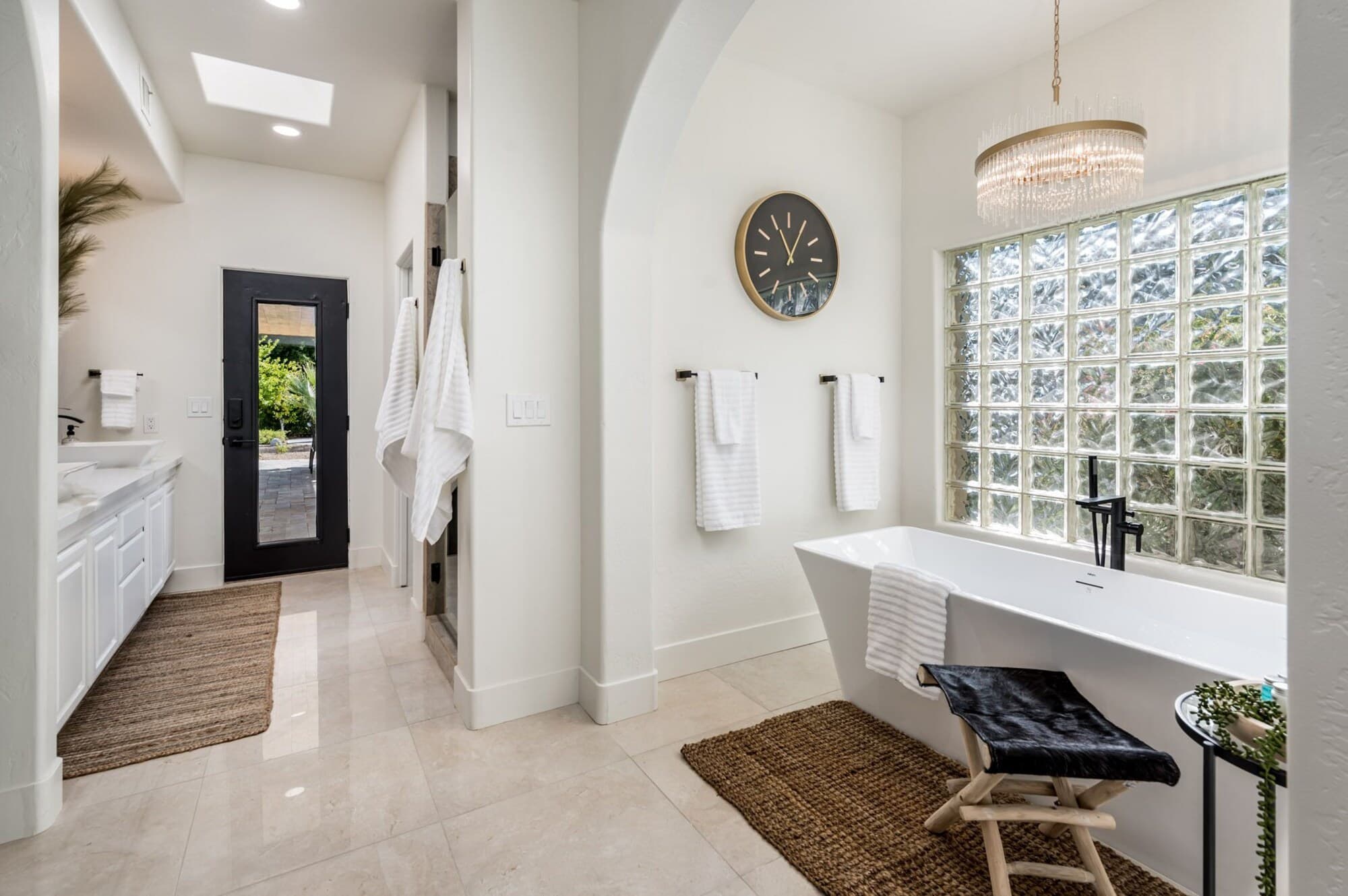Spa-style master bath with soaking tub and walk-in shower
