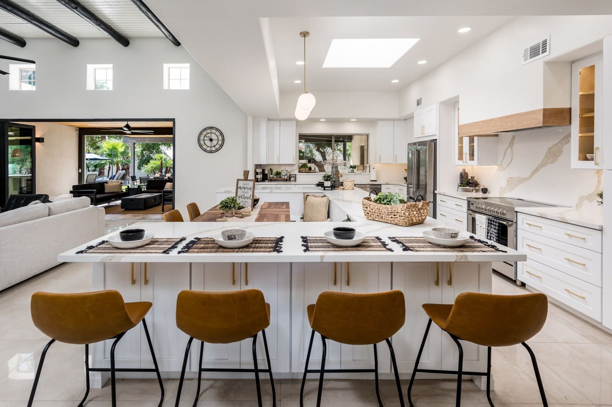 Renovated chef’s kitchen with waterfall island
