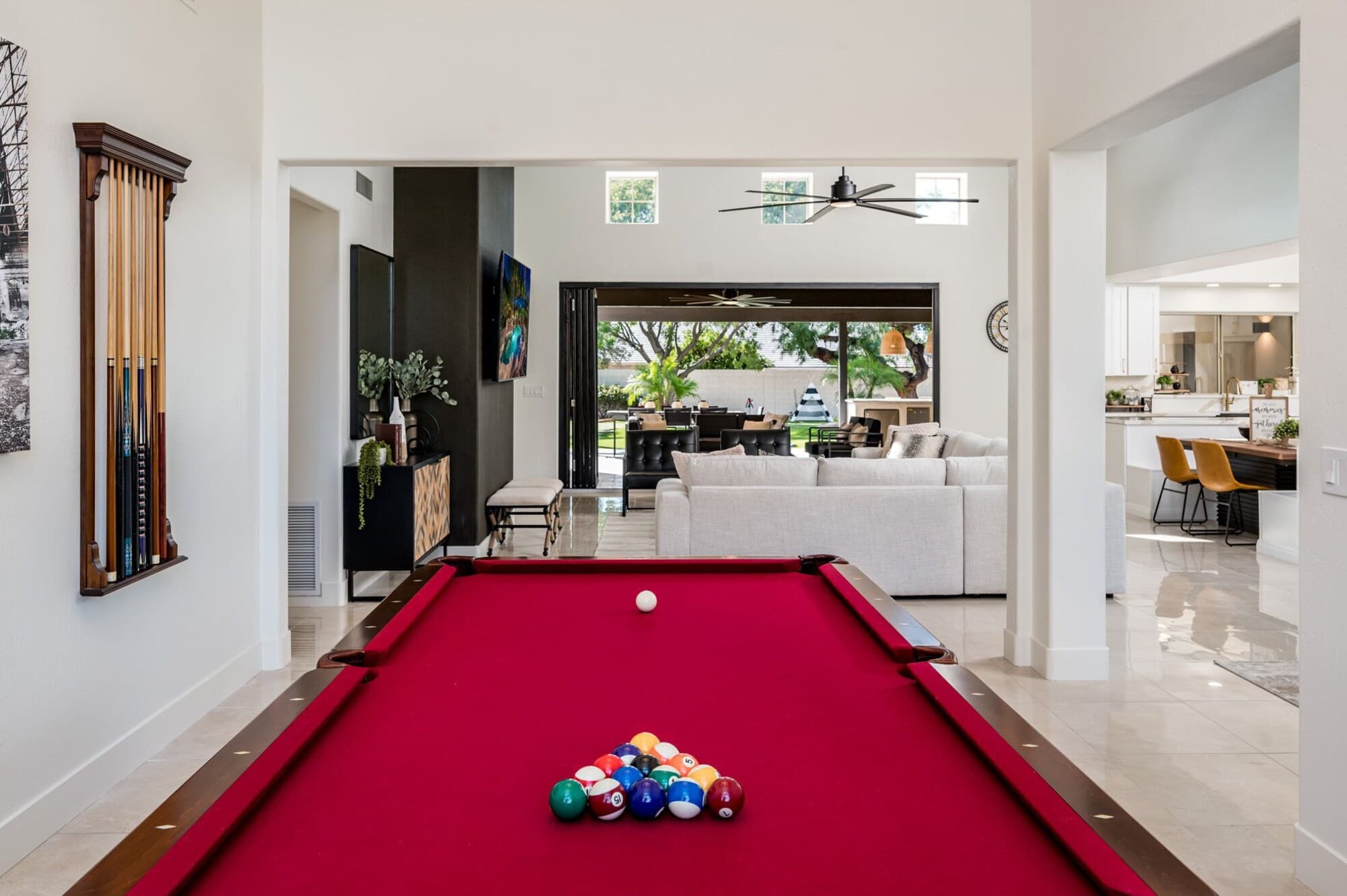 Game room billiards open to the living area