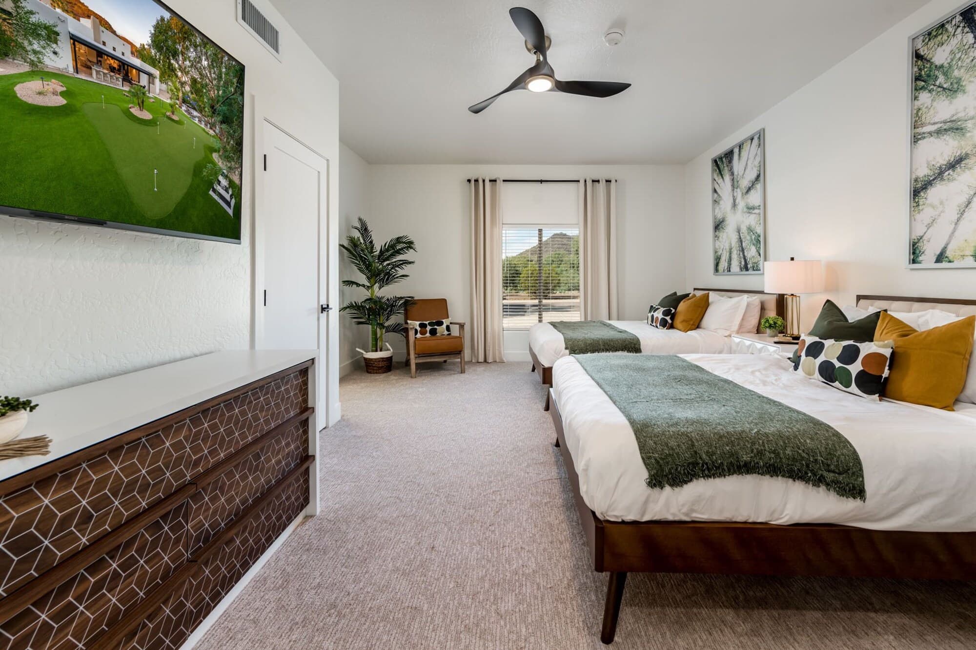 Ensuite bedroom with two queens and marble bath