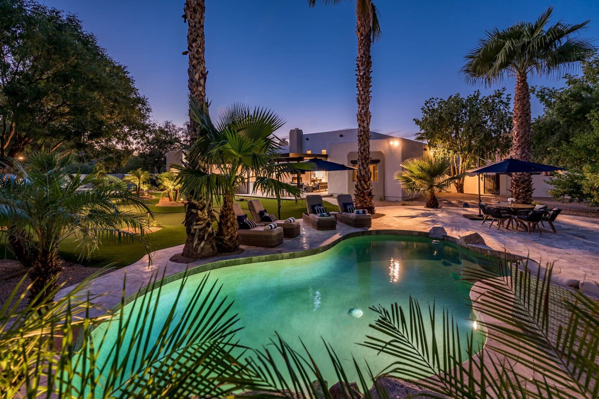 Pool and spa with travertine deck